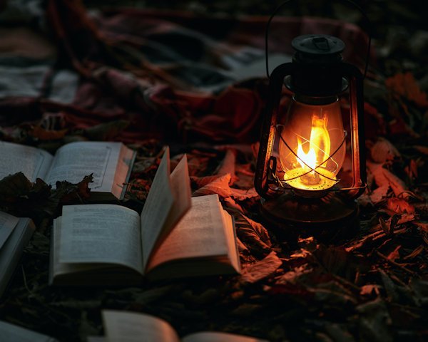 books with lantern by Tengyart (detail)